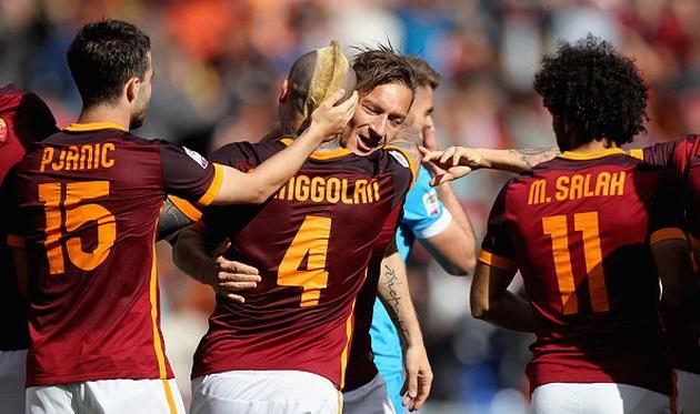 Автор победного гола - Наингголан и Тотти, Getty Images