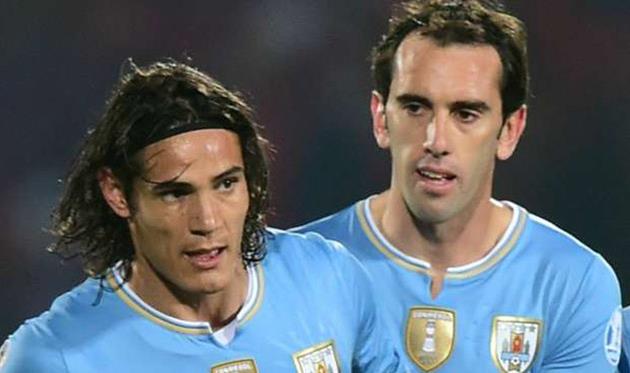 Диего Годин (справа) и Эдинсон Кавани, Getty images