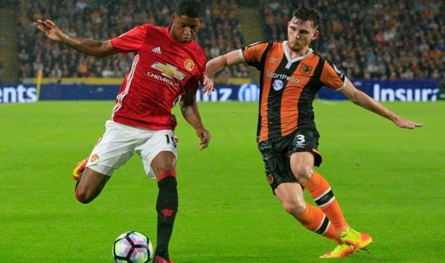 ЭНДРЮ РОБЕРТСОН (справа), AFP