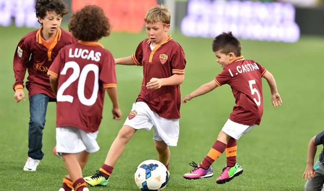 Кристиан Тотти (с мячом), Getty Images