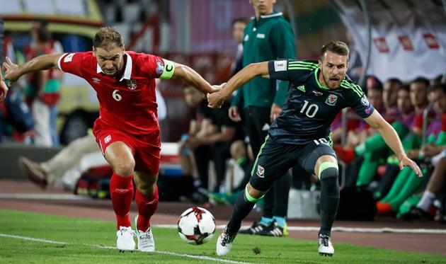 Бранислав Иванович и Аарон Рэмси, getty images