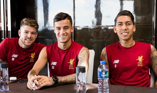 Филиппе Коутиньо (в центре) в Ливерпуле всем доволен, Getty Images