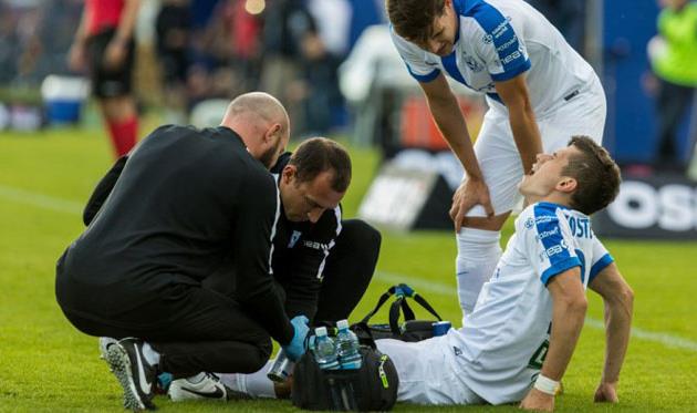 Владимир Костевич получает первую помощь, Getty Images