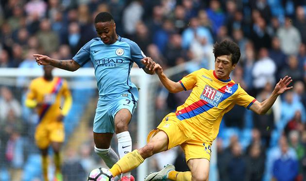 Рахим Стерлинг и Ли Чхон Ен, Getty Images