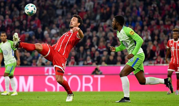 Матс Хуммельс и Ришадли Базур, Getty Images