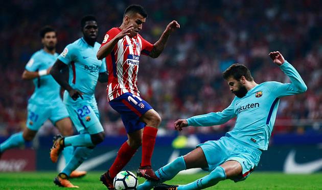 Жерар Пике (справа) в матче против Атлетико, getty images