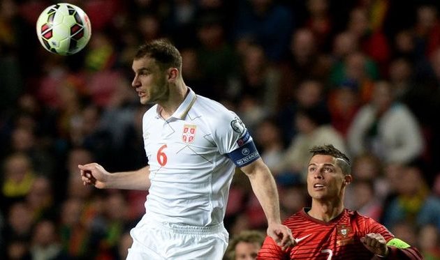 БРАНИСЛАВ ИВАНОВИЧ и Криштиану Роналду, getty images