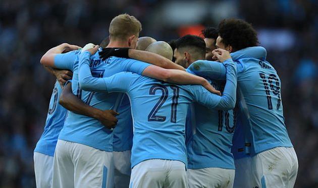 игроки манчестер сити празднуют взятие ворот, getty images