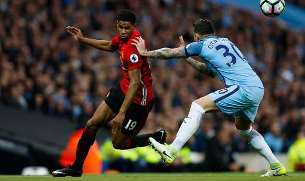 Маркус Рашфорд и Николас Отаменди, AFP