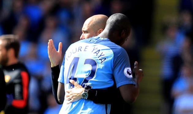 Яя Туре и Хосеп Гвардиола, Getty Images