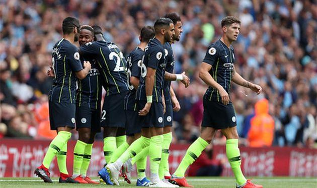 игроки манчестер сити отмечают взятие ворот, getty images