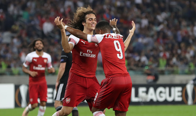 Гендузи (слева) забил первый гол за Арсенал, Getty Images