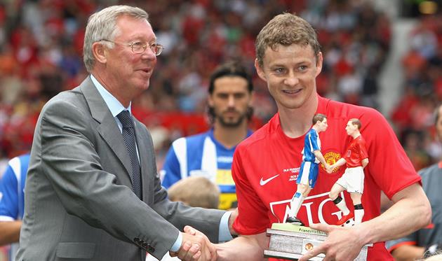 СЭР АЛЕКС ФЕРГЮСОН И ОЛЕ-ГУННАР СОЛСКЬЯЕР, GETTY IMAGES