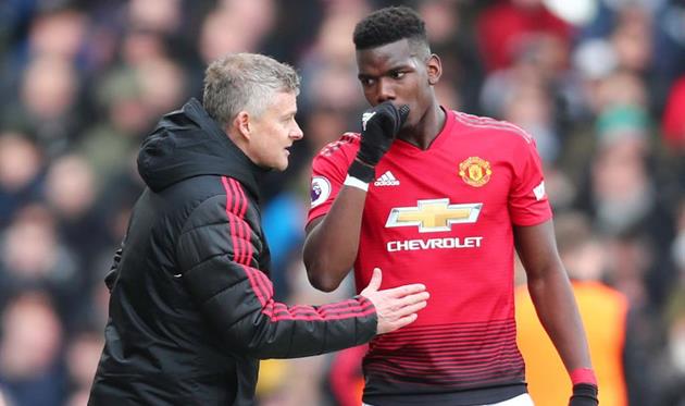 Оле-Гуннар Солскьяер (слева) и Поль Погба (справа), Getty Images