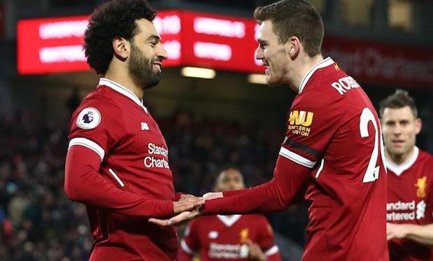 Мохаммед Салах (слева) и Эндрю Робертсон (справа), Getty Images