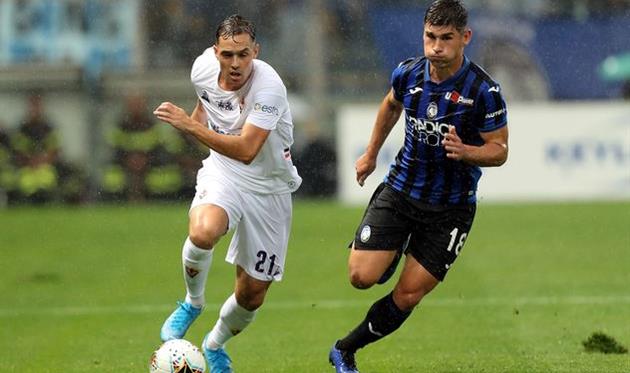 Руслан Малиновский (справа), Getty Images