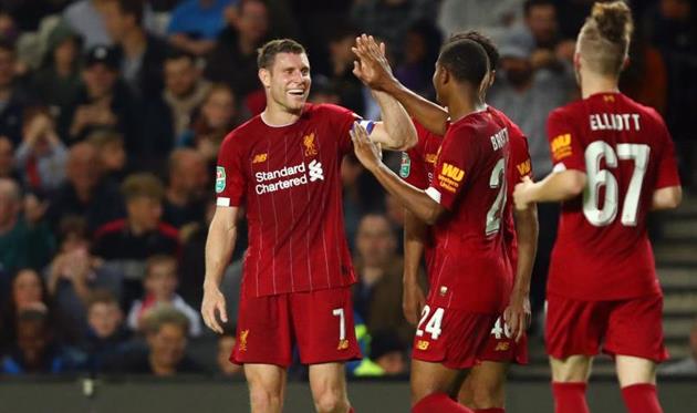 Милнер в окружении товарищей, getty images