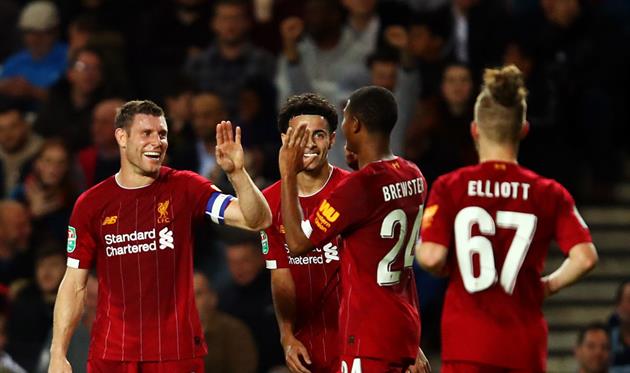 Милнер (слева) с молодежью Ливерпуля, Getty Images