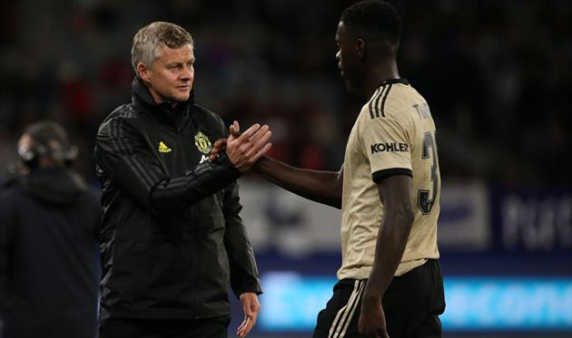 Оле-Гуннар Солскьяер и Аксель Туанзебе, Getty Images