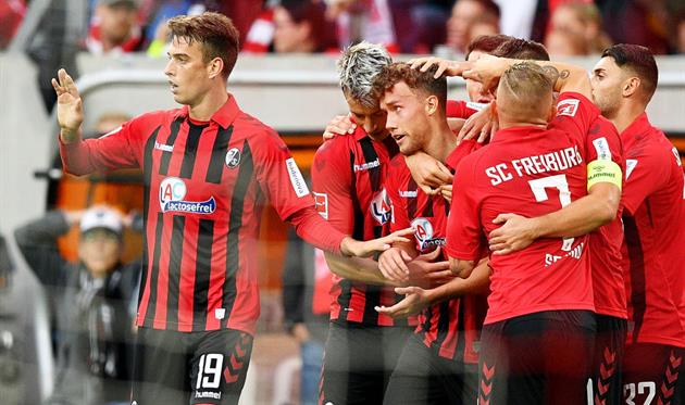 Фрайбург празднует гол, getty images