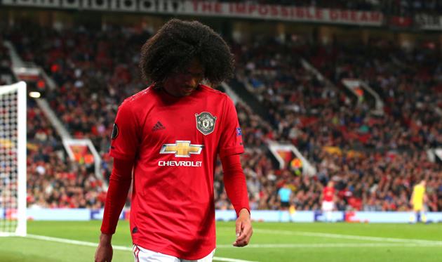 Таит Чонг с логотипом Chevrolet, Getty Images