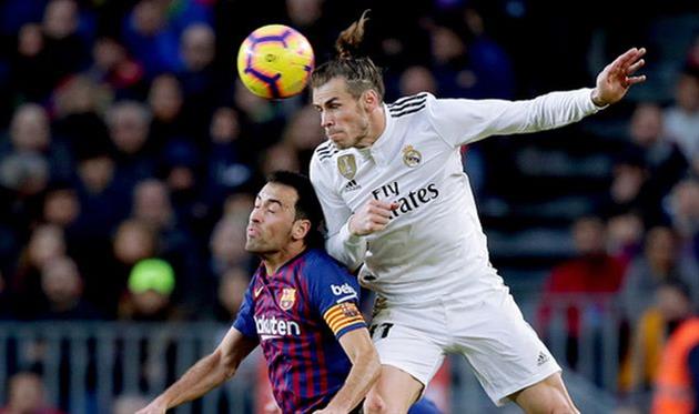 гарет бэйл и серхио бускетс, getty images