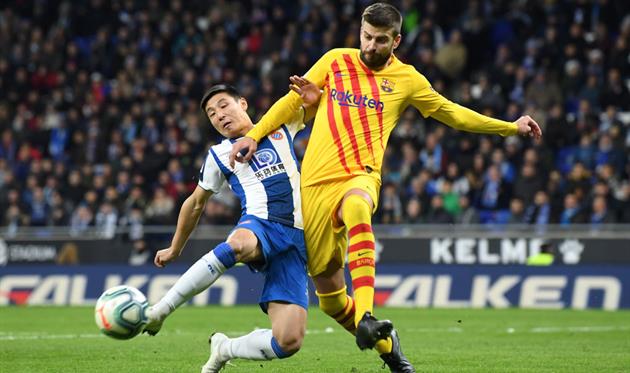 Жерар Пике (справа) против Ву Лея, Getty Images