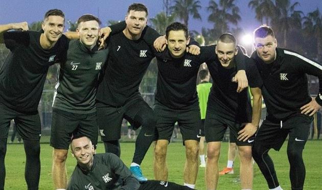 Дмитрий Литвин (слева) и игроки Колоса, getty images