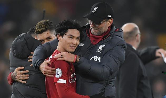 Такуми Минамино и Юрген Клопп, Getty Images