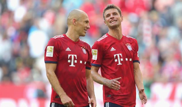 ТОМАС МЮЛЛЕР И АРЬЕН РОББЕН, ФОТО GETTY IMAGES