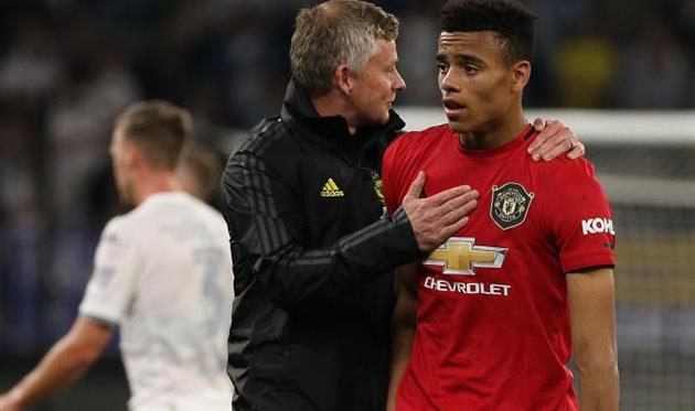 Оле-Гуннар Солскьяер и Мейсон Гринвуд, Getty Images