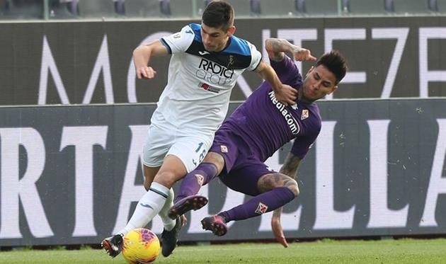 Руслан Малиновский (слева), Getty Images