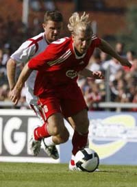 Поляк Соболевски не успевает за Ворониным, фото Reuters