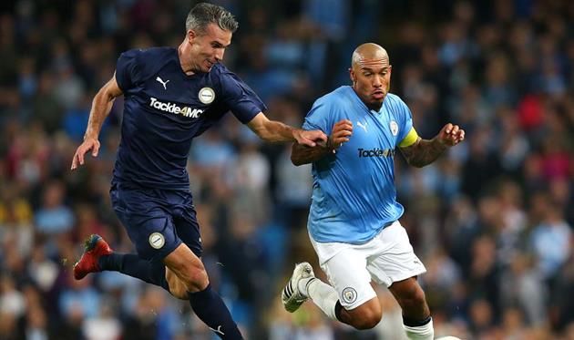 Робин Ван Перси (слева), Getty Images