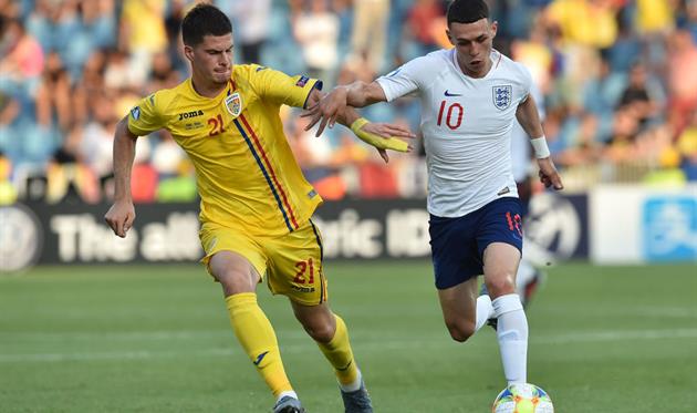 Тудор Белуцэ (слева), Getty Images