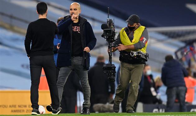 Хосеп Гвардиола (лицом) и Микель Артета (спиной), Getty Images