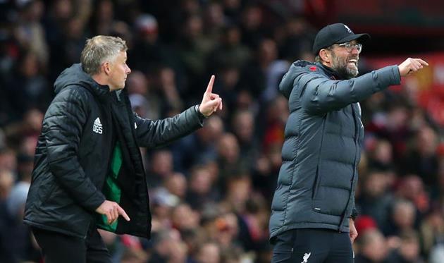 Оле-Гуннар Солскьяер (слева) и Юрген Клопп, Getty Images