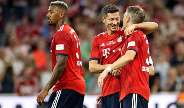 Джером Боатэнг (слева), Роберт Левандовски (по центру) и Бастиан Швайнштайнгер, Getty Images