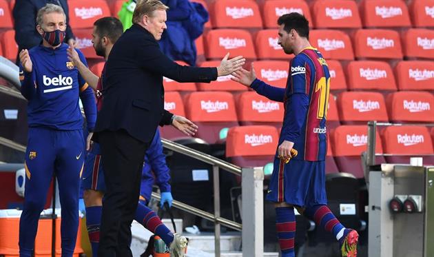 Рональд Куман (слева) и Лионель Месси, Getty Images