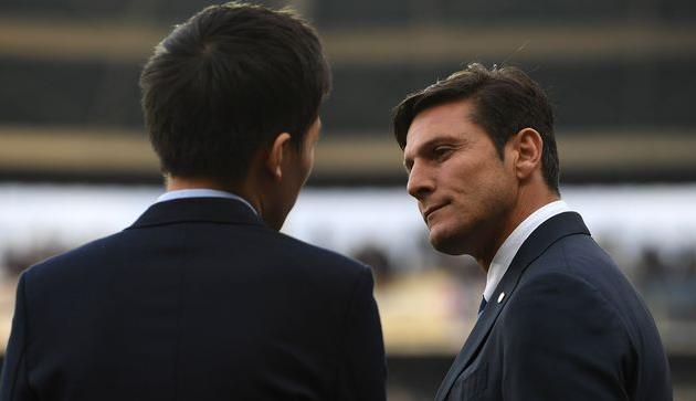 Хавьер Дзанетти (лицом) и Стивен Чжан, Getty Images