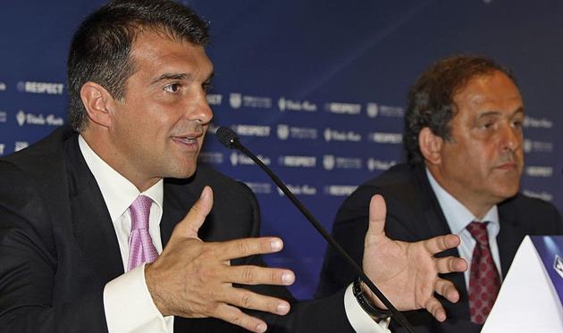 Жоан Лапорта (cлева), Getty Images