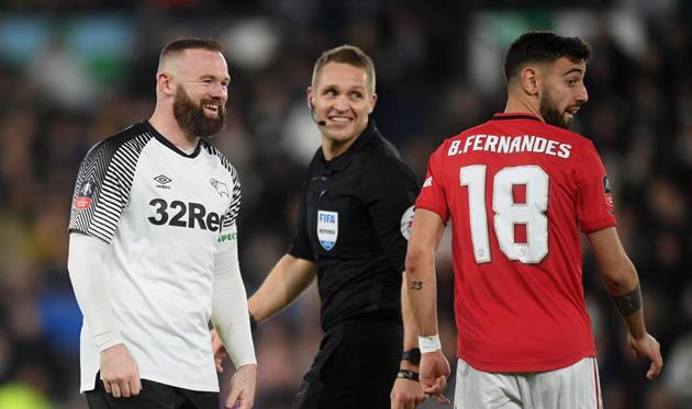 Уэйн Руни (слева) и Бруну Фернандеш, Getty Images