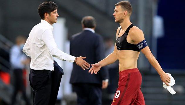 Паулу Фонсека (слева) и Эдин Джеко, Getty Images