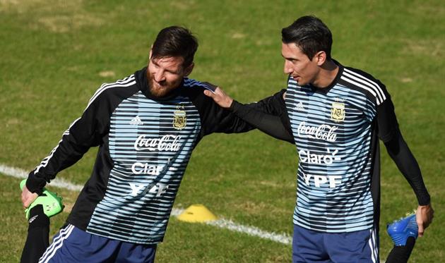 Лионель Месси (слева) и Анхель Ди Мария, Getty Images