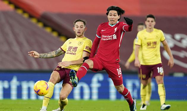 Такуми Минамино (по центру), Getty Images