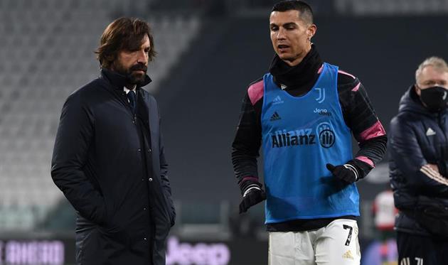 Андреа Пирло (слева) и Криштиану Роналду, getty images