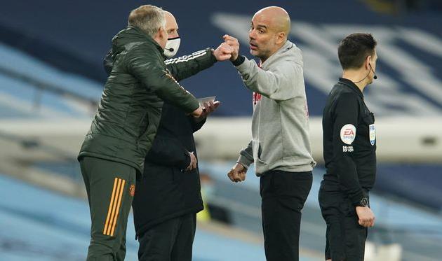 Оле-Гуннар Солскьяер и Хосеп Гвардиола (справ), Getty Images