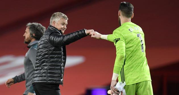 Оле-Гуннар Солскьяер (слева) и Давид де Хеа, Getty Images