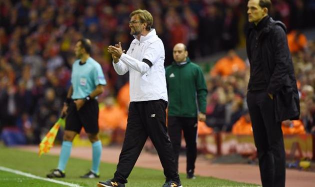 Юрген Клопп (в центре) и Томас Тухель, Getty Images