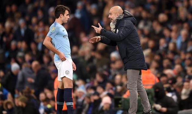 Эрик Гарсия (слева) и Хосеп Гвардиола, getty images